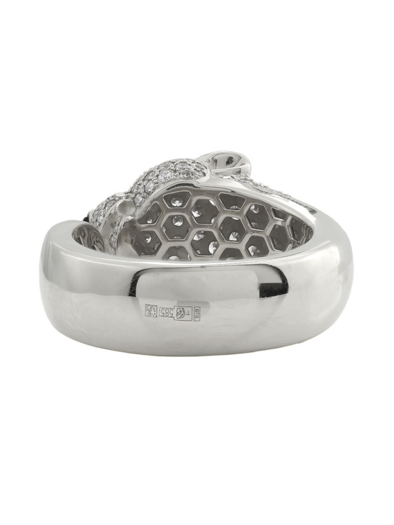 Кольцо из белого золота c бриллиантами, изумрудом и ониксом