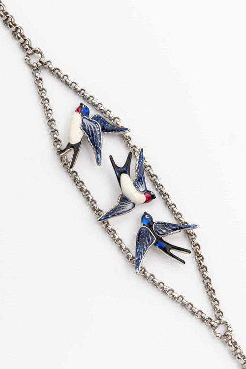 Браслет из белого золота c эмалью и сапфиром