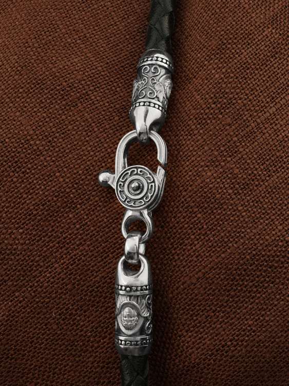 Гайтан из белого золота c кожаным шнурком и ониксом