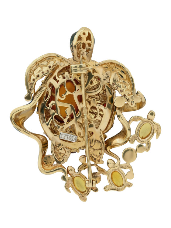 Брошь из лимонного золота c эмалью, фианитом, гранатом и янтарём