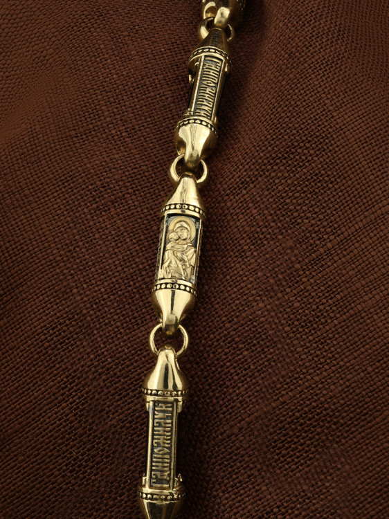 Гайтан из лимонного золота c кожаным шнурком и ониксом