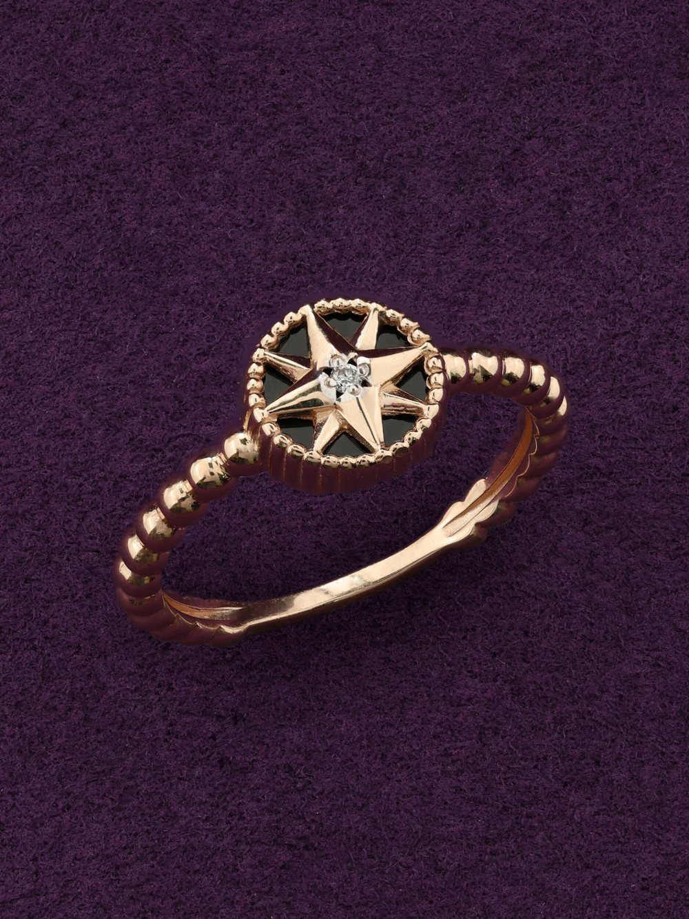 Кольцо из золота c бриллиантами и ониксом