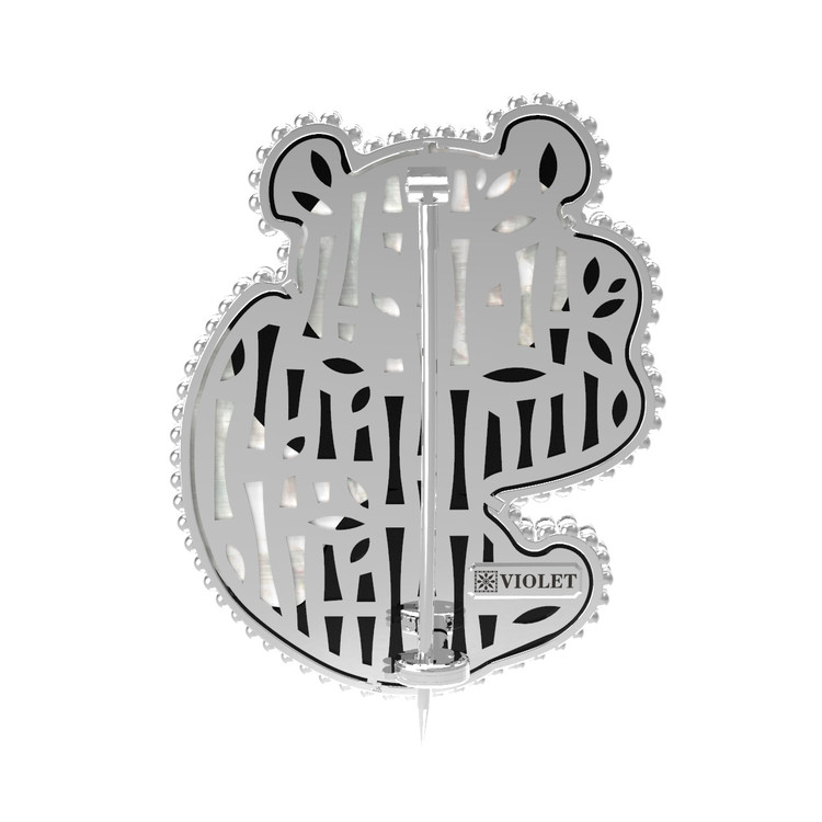 Брошь из белого золота c эмалью, ониксом и перламутром