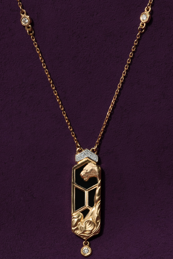 Колье из золота c бриллиантами и ониксом