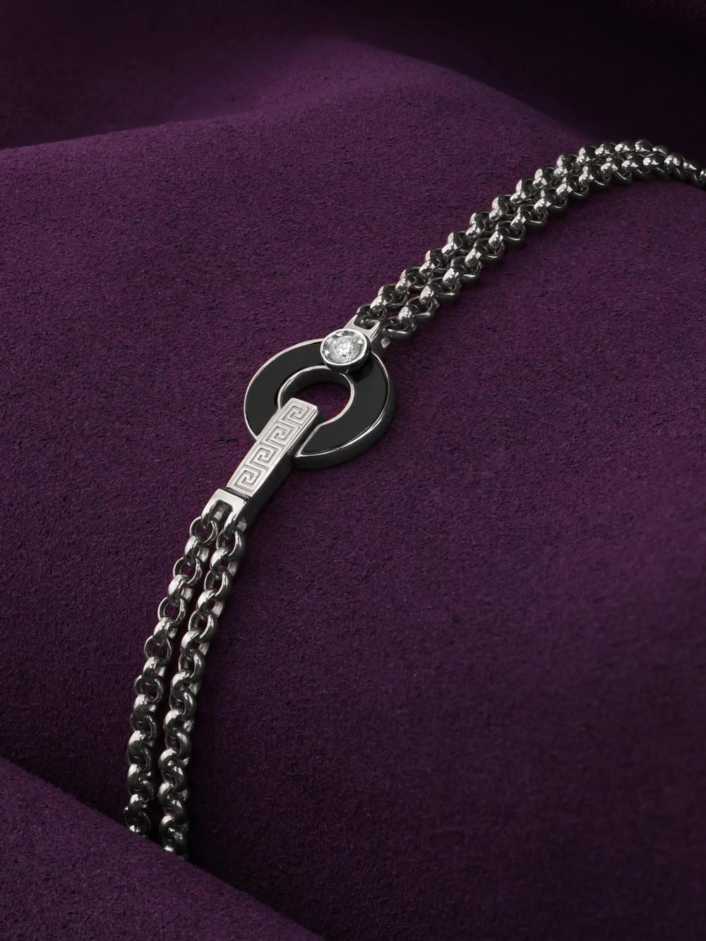 Браслет из белого золота c бриллиантами и ониксом